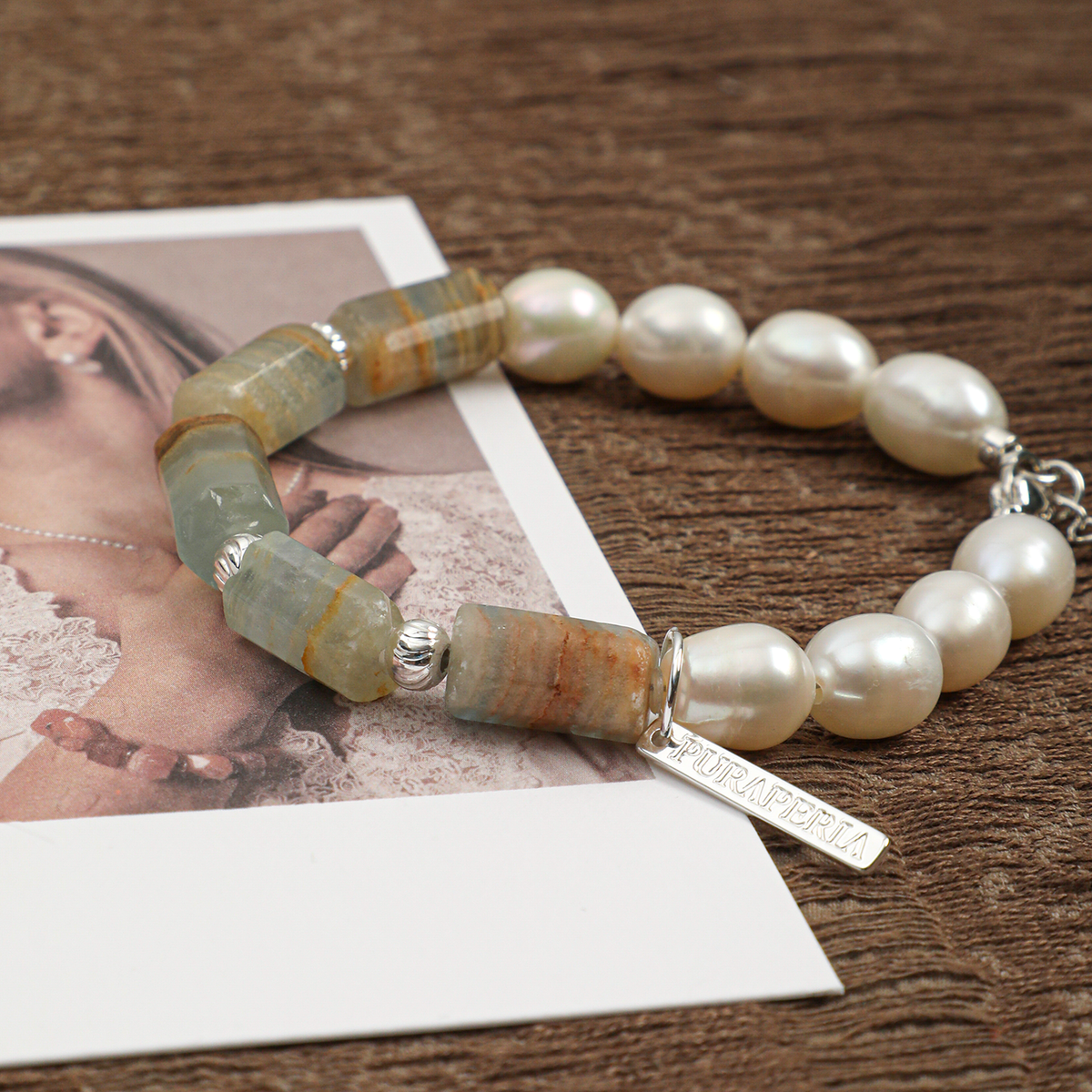 Close-up of freshwater pearls and Blue Lishi stone barrel beads