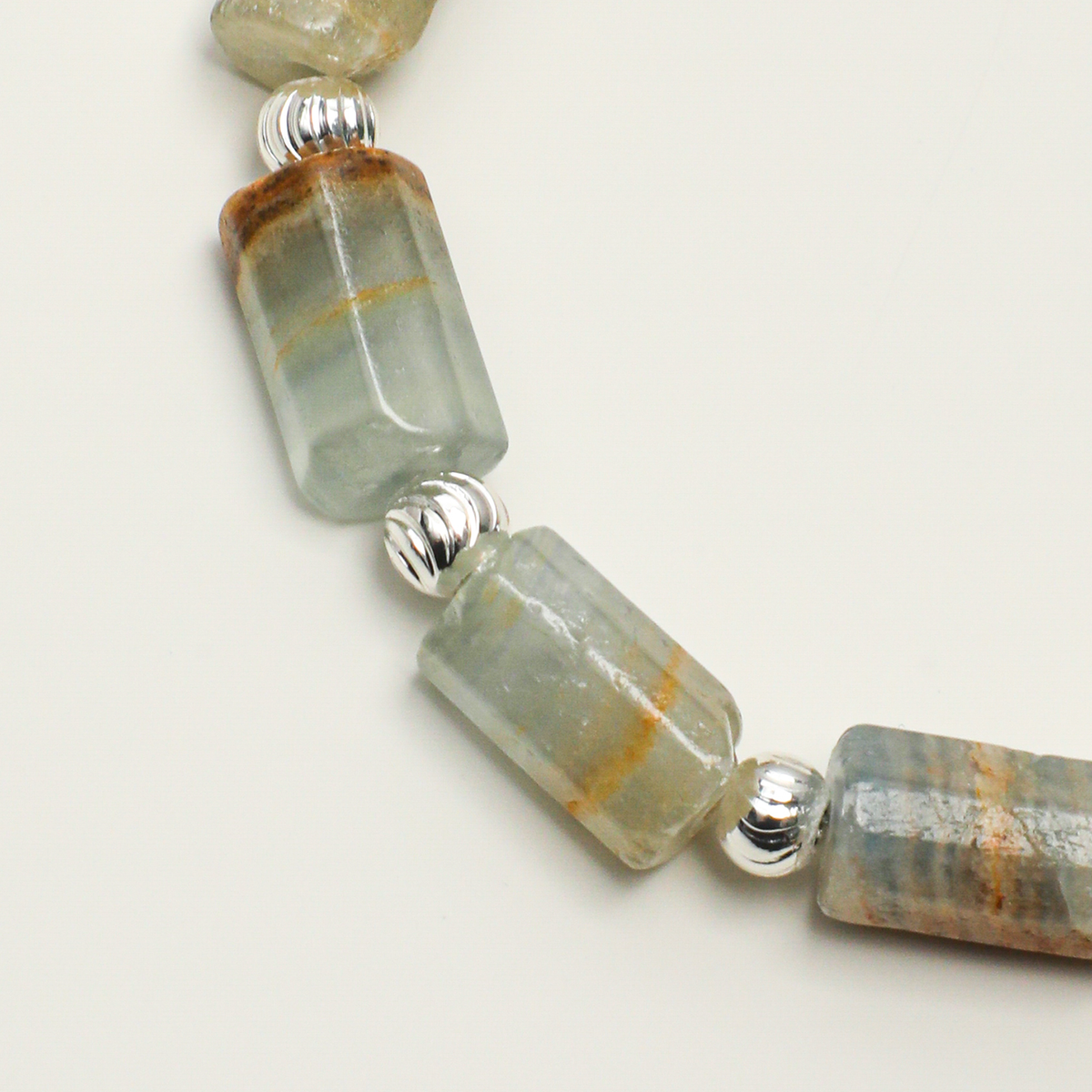 Blue Lishi stone barrel bead color and natural veining detail