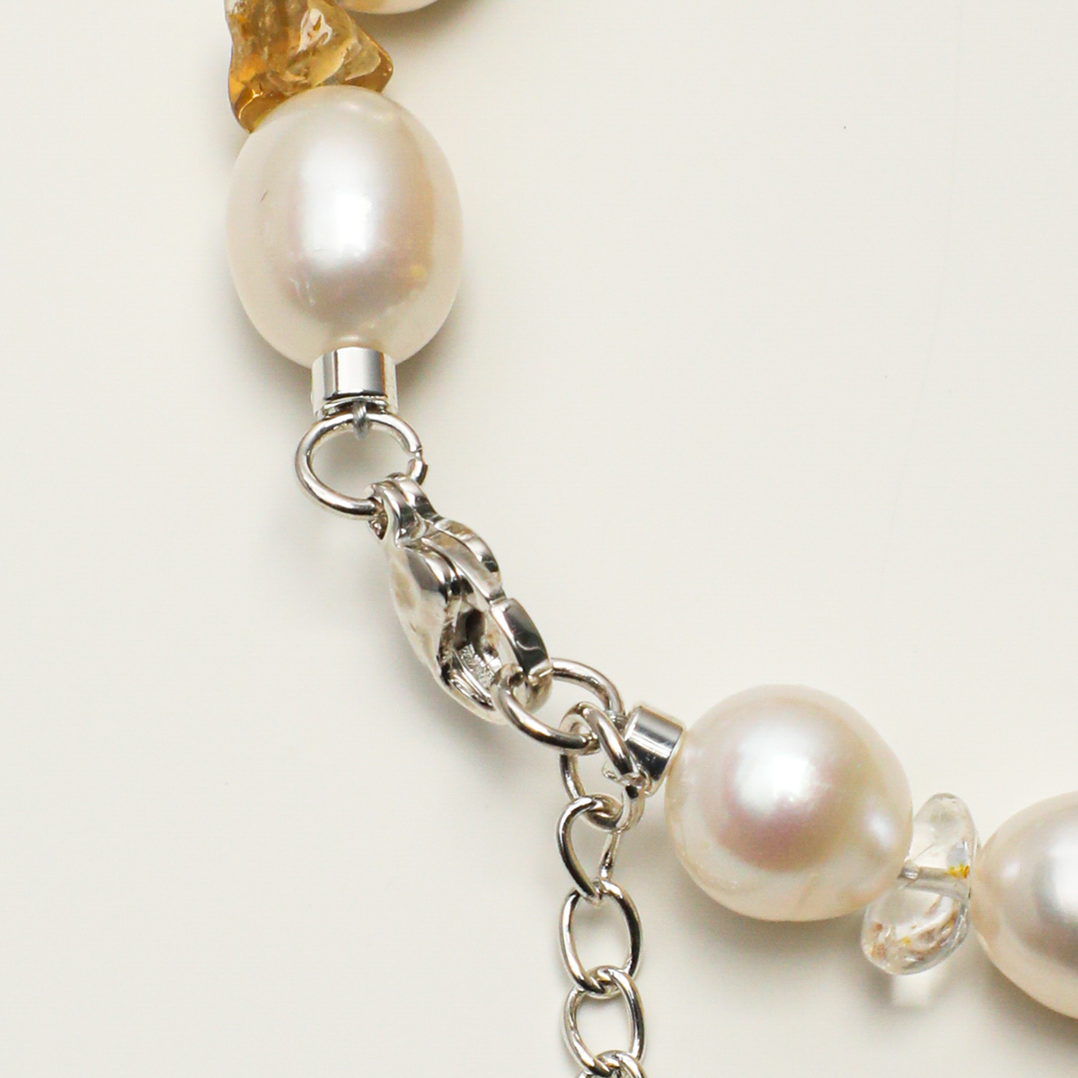 Silver-plated 316L stainless steel lobster clasp and extender chain detail