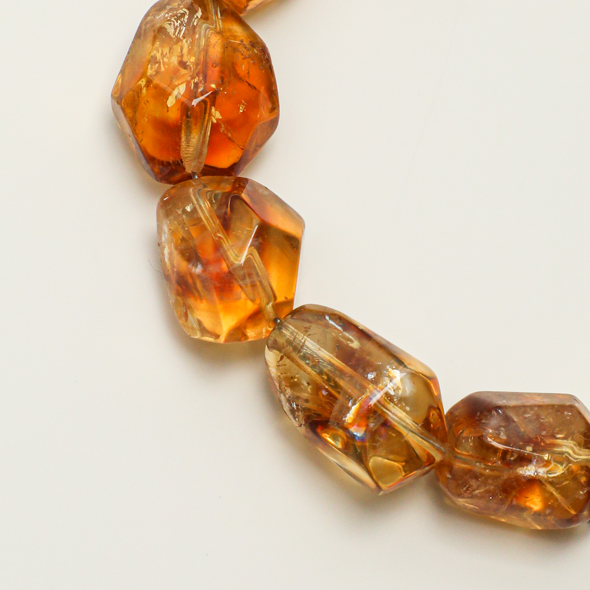 Free-form citrine bead color and natural variation detail