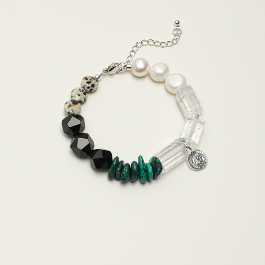 Black agate, malachite, clear quartz, spotted stone, and pearl adjustable bracelet, full product view