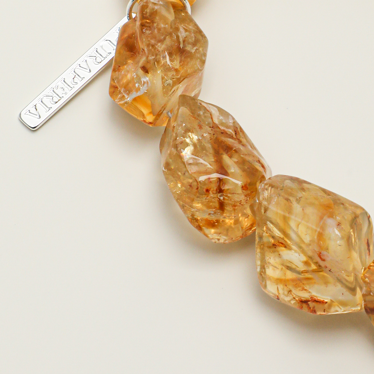 Natural citrine freeform stones with visible internal inclusions