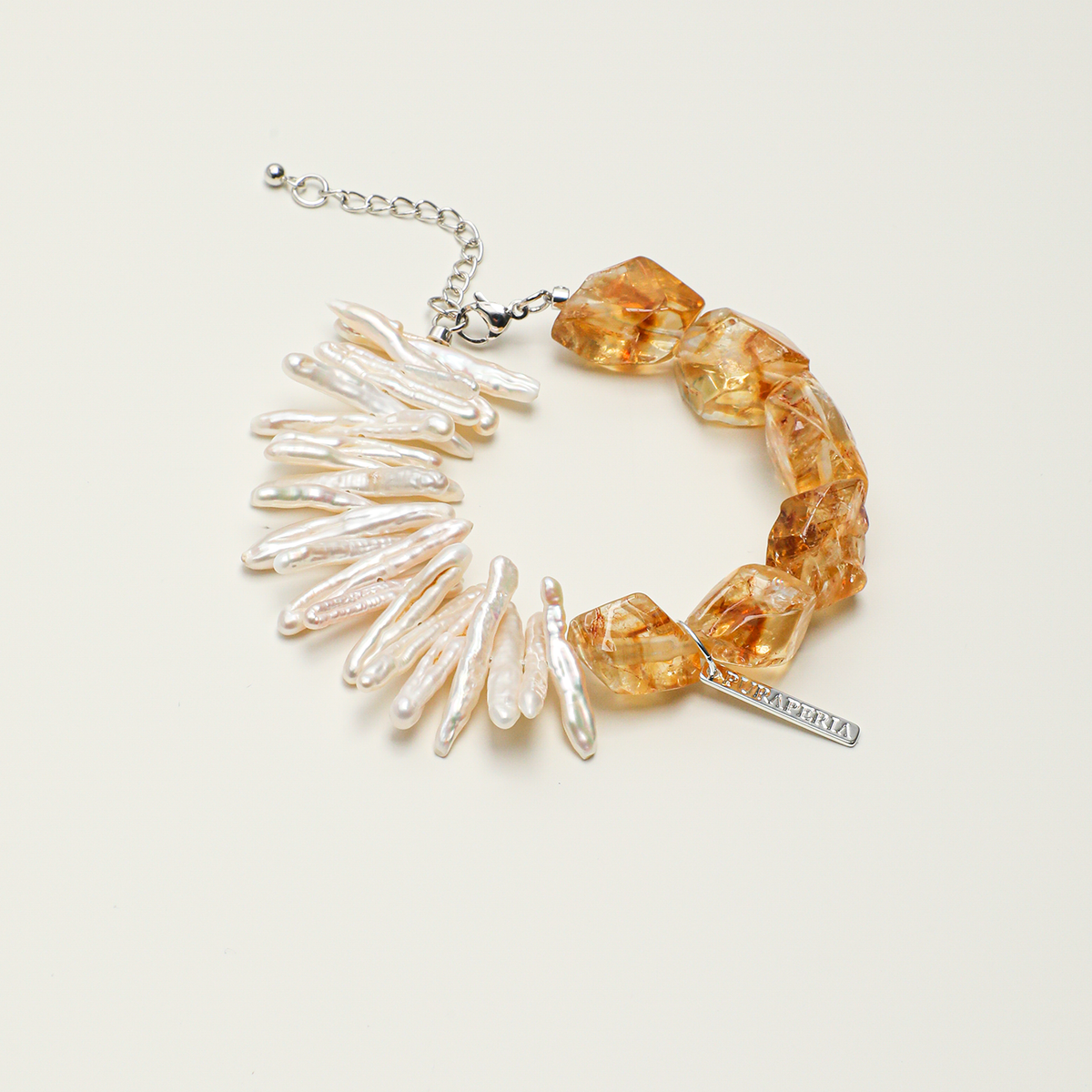 Citrine and freshwater pearl adjustable bracelet with silver-tone details